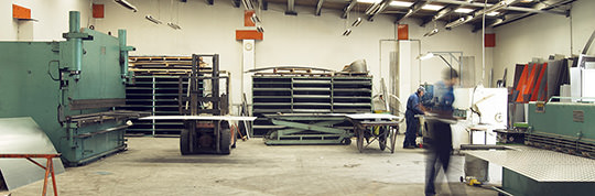 sheetmetal factory with workers
